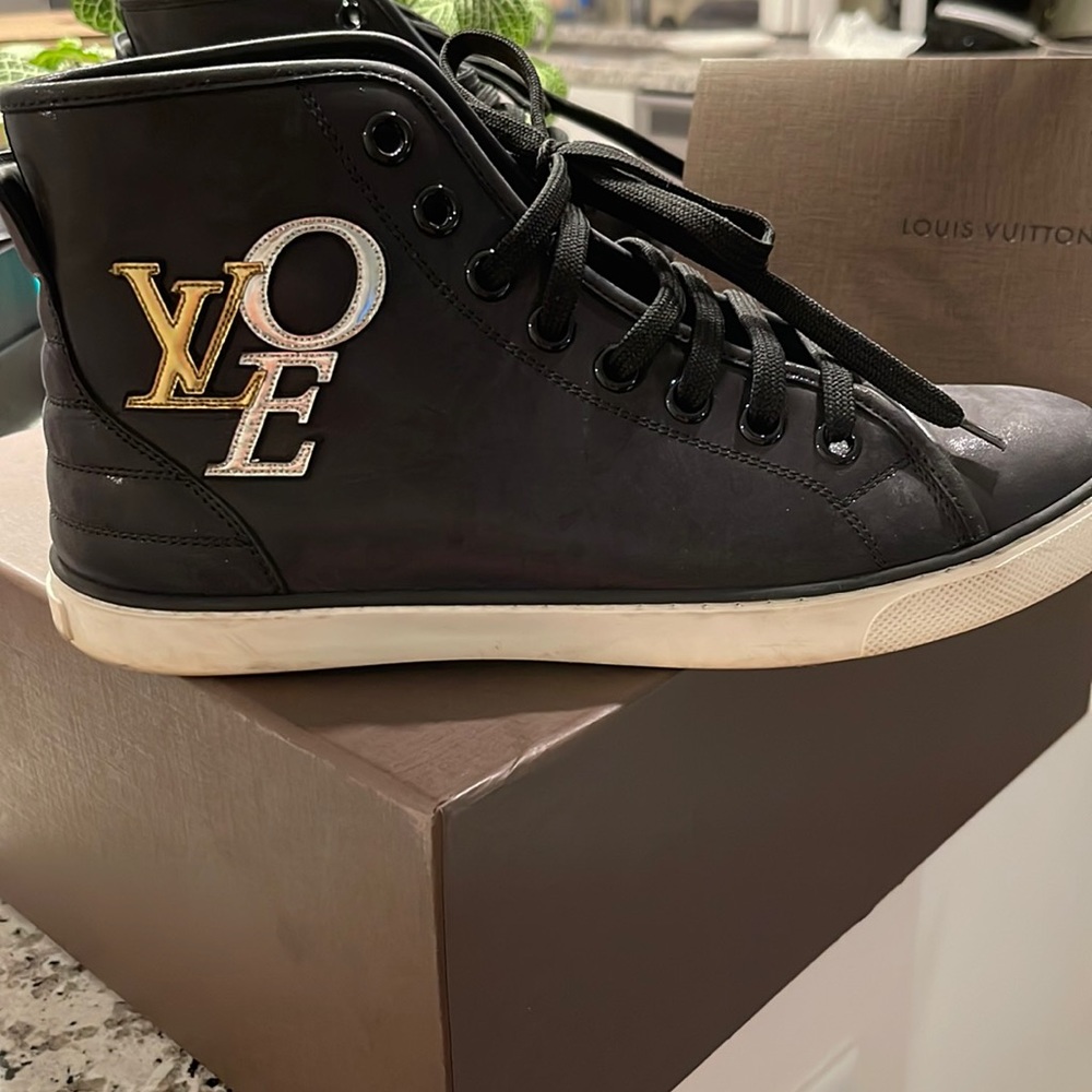 Louis Vuitton
Black Calfskin Punchy Love Patch High Top Sneakers
Size: EU 38.5